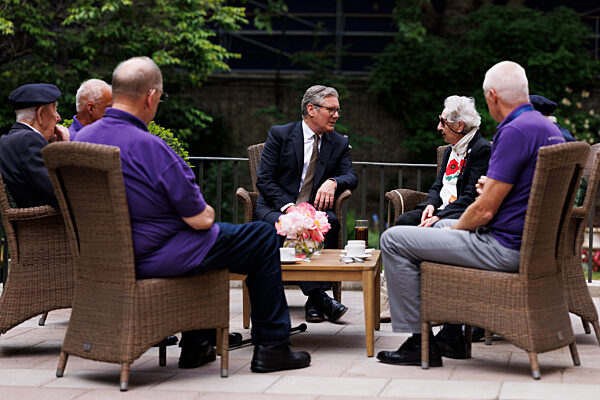 Prime Minister Keir Starmer meets D-Day veteran and Taxi Drivers