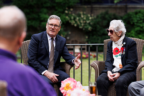 Prime Minister Keir Starmer meets D-Day veteran and Taxi Drivers