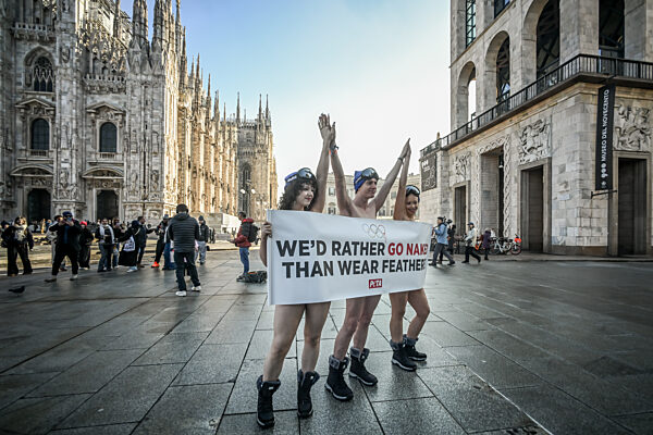 PETA protests "We'd Rather go naked than wear feathers!" before the Olympics.