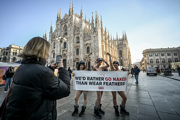 PETA protests "We'd Rather go naked than wear feathers!" before the Olympics.
