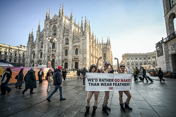 PETA protests "We'd Rather go naked than wear feathers!" before the Olympics.