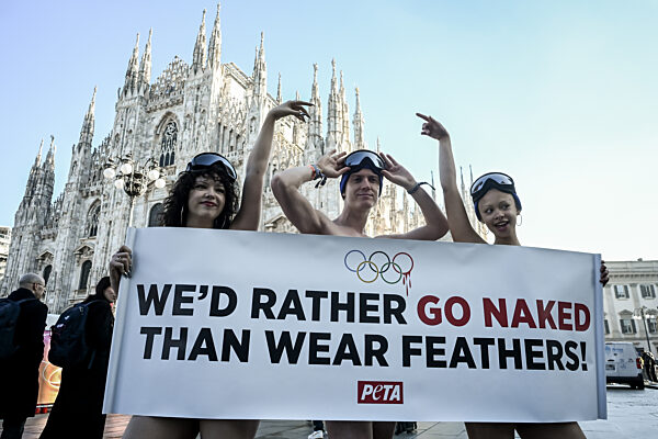 PETA protests "We'd Rather go naked than wear feathers!" before the Olympics.