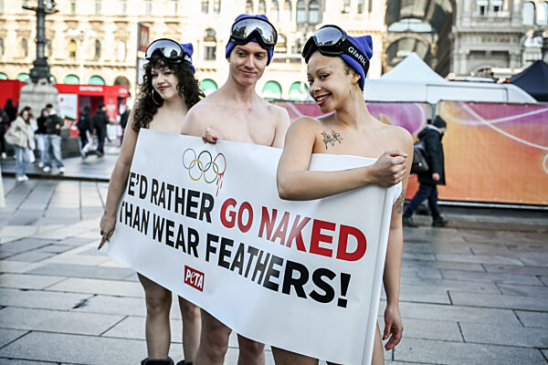 PETA protests "We'd Rather go naked than wear feathers!" before the Olympics.