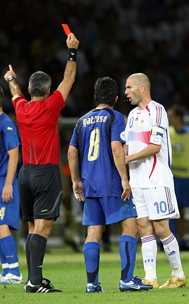 Zinedine Zidane (R) from France is shown the red card by referee Horacio...