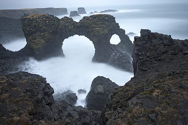 Felsenfenster an der Kueste bei Arnarstapi, rock window at the coast of Arnarstapi