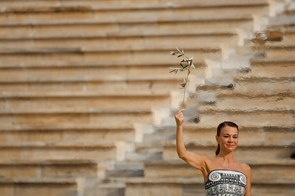 Übergabe des olympischen Feuers