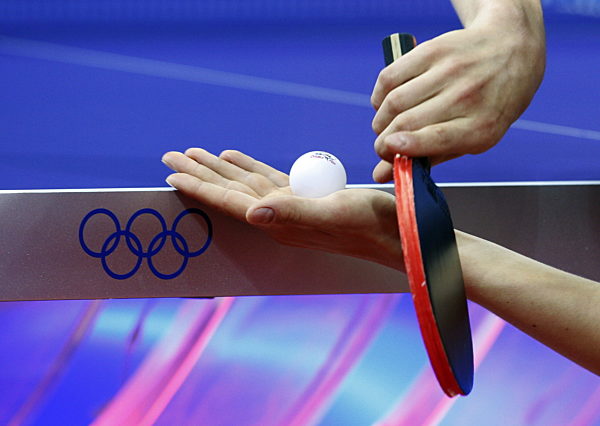 Dimitrij Ovtcharov of Germany serves the ball during the men's Beijing 2008...