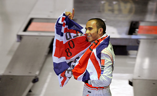 British Formula One driver Lewis Hamilton of McLaren Mercedes celebrates his...