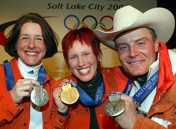 Salt Lake City 2002: Kati Wilhelm, Uschi Disl und Sven Fischermit Medaillen