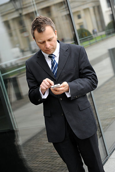 Geschäftsmann mit Smartphone