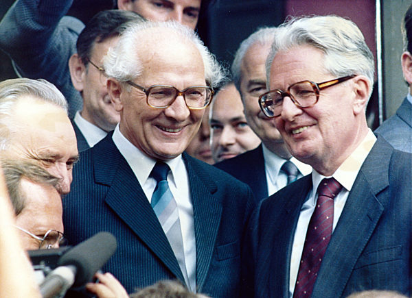 East German leader Erich Honecker welcomes Hans-Jochen Vogel (right)...