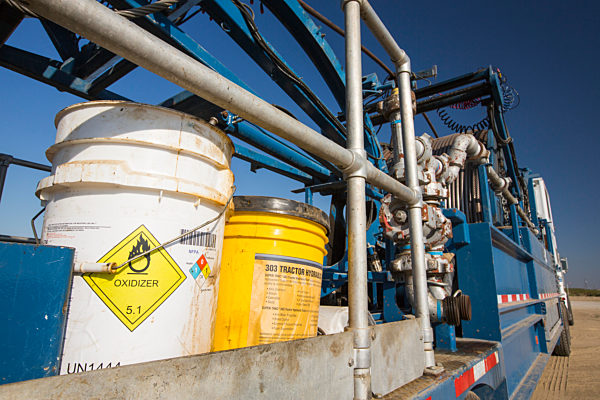 A fracking truck next to a site being fracked near Wasco in California's Central Valley, USA. Fracking for natural gas and oil, has reduced energy prices in the US, but fracking is a water hungry industry, that competes directly with the agricultural secto