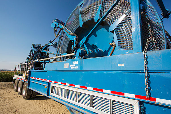 A fracking truck next to a site being fracked near Wasco in California's Central Valley, USA. Fracking for natural gas and oil, has reduced energy prices in the US, but fracking is a water hungry industry, that competes directly with the agricultural secto