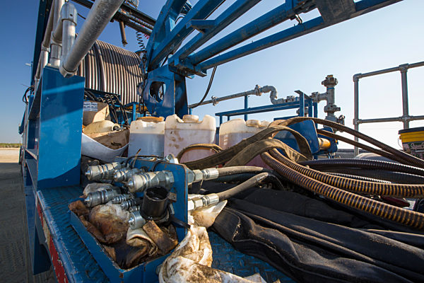 A fracking truck next to a site being fracked near Wasco in California's Central Valley, USA. Fracking for natural gas and oil, has reduced energy prices in the US, but fracking is a water hungry industry, that competes directly with the agricultural secto