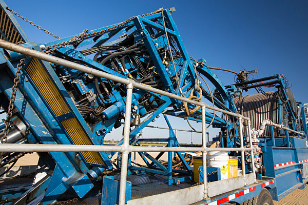 A fracking truck next to a site being fracked near Wasco in California's Central Valley, USA. Fracking for natural gas and oil, has reduced energy prices in the US, but fracking is a water hungry industry, that competes directly with the agricultural secto