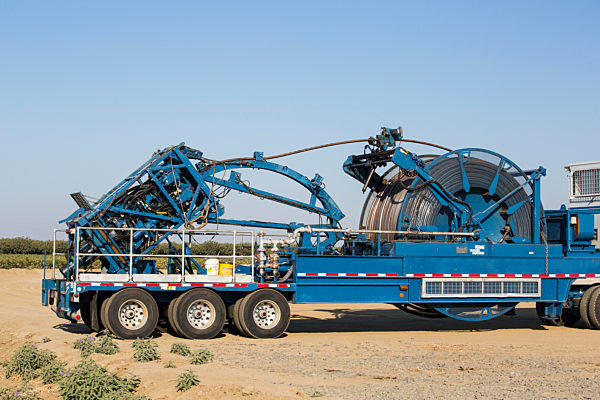A fracking truck on a site being fracked near Wasco in California's Central Valley, USA. Fracking for natural gas and oil, has reduced energy prices in the US, but fracking is a water hungry industry, that competes directly with the agricultural sector for