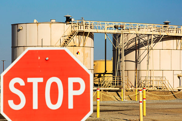 A fracking truck on a site being fracked near Wasco in California's Central Valley, USA. Fracking for natural gas and oil, has reduced energy prices in the US, but fracking is a water hungry industry, that competes directly with the agricultural sector for