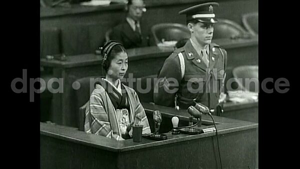 January 14, 1948 – Tokyo Japan: Comyns Carr questions Mrs. Yasuko Konoye and General T. Taylor reads his summation during War Crimes Trials in Tokyo.