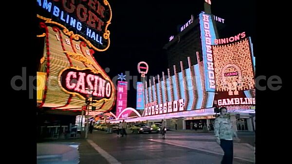 November 24, 1976 – Las Vegas Nevada USA: Casinos - the major attractions in Las Vegas; neon lights advertising casinos and hotels.