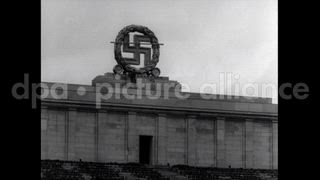 April 25, 1945 – Nuremberg Germany: German Swastika emblem is demolished at Zeppelinfeld in Nurnberg,Germany.