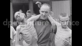 May 8, 1945 – Ebensee Austria: Emaciated prisoners of a Nazi concentration camp in Ebensee, Austria released after liberation of the camp in World War 2