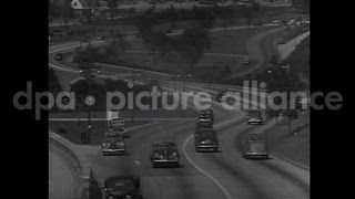 1953 – United States USA: Views of the United States. Farms, cities, highways, and beaches. Destruction in Japan by atomic bomb. U.S. infantry in combat