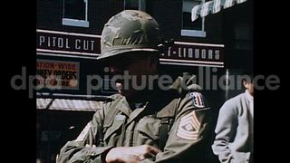April 9, 1968 – Baltimore Maryland USA: U.S. soldiers stand at street corners after the Baltimore Riots in Baltimore, Maryland.