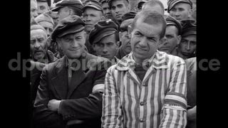 May 5, 1945 – Dachau Germany: Mr Micholet talks about his experiences and the conditions which led to him being taken prisoner in Dachau, Germany.