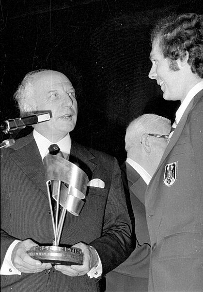 Walter Scheel und Franz Beckenbauer bei der Feier zum WM Sieg in München, 1974