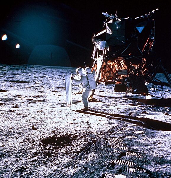 Astronaut Edwin Aldrin setting up the solar wind accelerometer