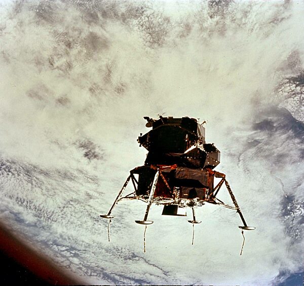 The "Spider" Lunar Module above Earth