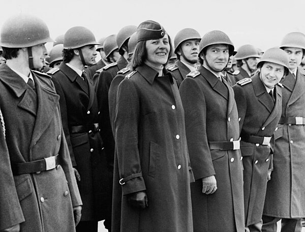 Female doctor with male comrades, 1982