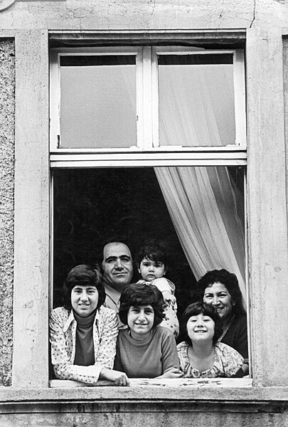 Guest worker family at the window