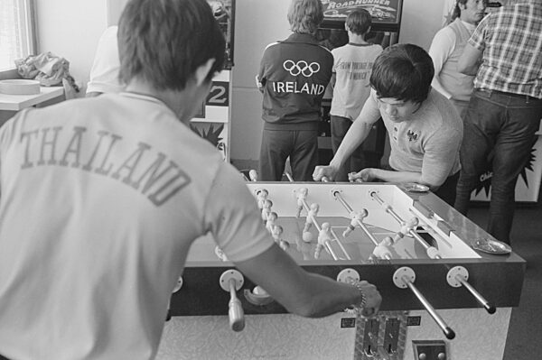 Athletes playing table football in the Olympic Village, 1972
