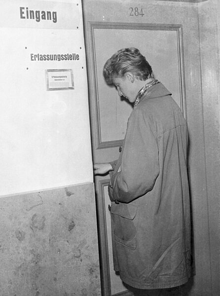 Applicants at a community service registration office, 1956