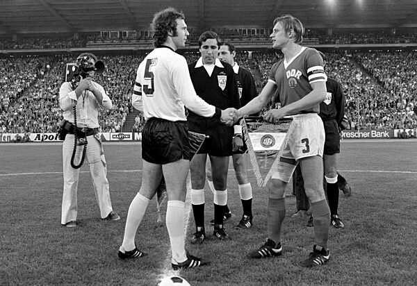 The 1974 FIFA World Cup: Beckenbauer (GER) and Bransch (GDR)