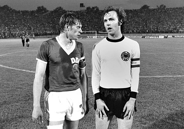 The 1974 FIFA World Cup: Bransch (GDR) and Beckenbauer (GER)