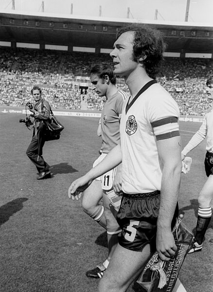 Soccer World Cup 1974 / Final round Group B / FRG - Yugoslavia 2:0 / 26.06.1974 in Duesseldorf / The two team captains: Franz Beckenbauer (Deut./front) and Dragan Dzajic (Yugoslavia) come onto the pitch.