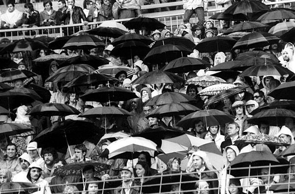 Soccer World Cup 1974 2nd round / BR Germany - Sweden 4:2 / 30.06.1974 in Duesseldorf / spectators with umbrellas