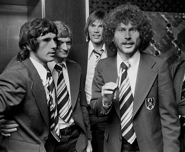World Cup 1974: Banquet after the final Germany-Netherlands 2:1 on 07.07.1974/ from left: Gerd Mueller, Dieter Herzog, Norbert Nigbur and Paul Breitner with cigar