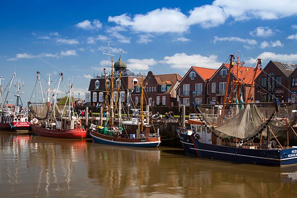 Crab cutters in the harbour of  Neuharlingersiel, East Friesland...