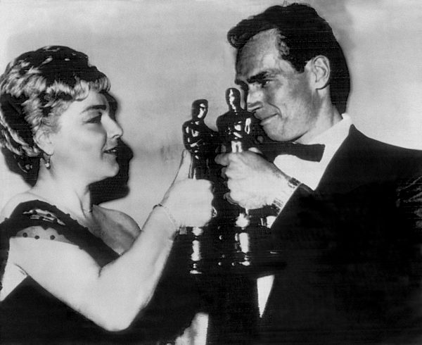 C. Heston and S.Signoret