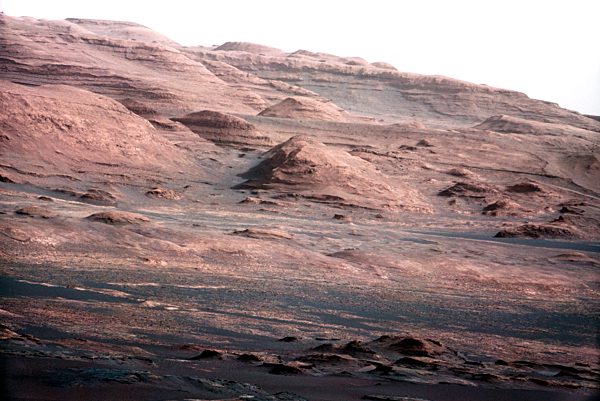 A chapter of the layered geological history of Mars is laid bare in this postcard from NASA's Curiosity rover. The image shows the base of Mount Sharp, the rover's eventual science destination.