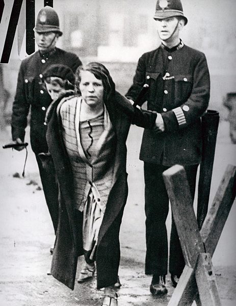 Suffragette arrested by police during a protest for women's suffrage (voting) circa 1910-12