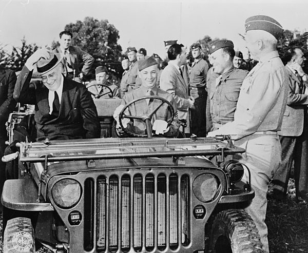 Casablanca, Morocco. President Roosevelt reviewing American troops from an Army jeep 19430101