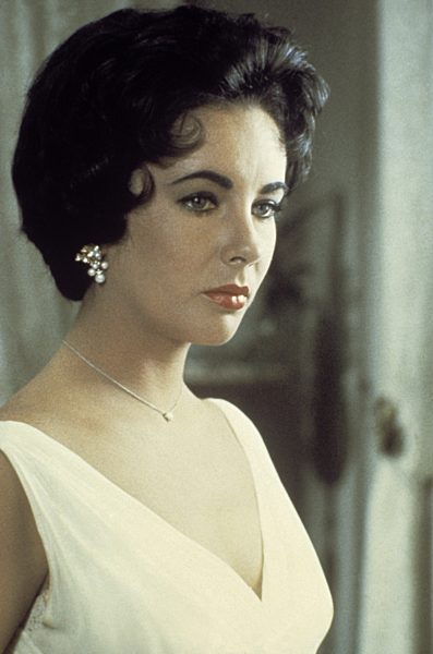 DIE KATZE AUF DEM HEISSEN BLECHDACH Cat on a hot tin roof