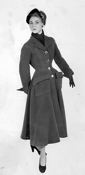 Christian Dior creates the New Look, 1947 Tight fitting coat, red wool...