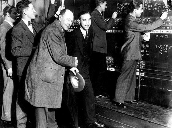 The Wall Street Crash 1929 Buyers in a stockbrokers office showing joy at...