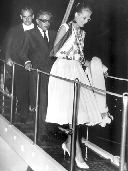Arisitotle Onassis, Pince Rainier and Princess Grace (Kelly) coming down the...