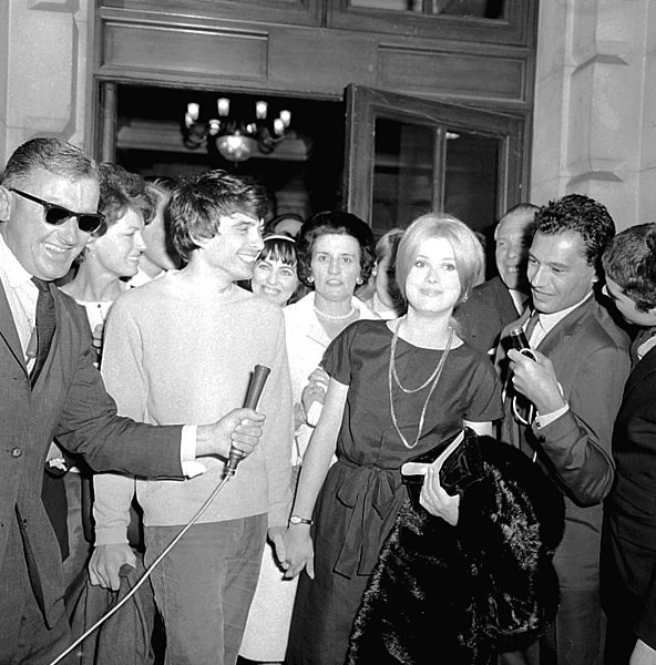 London fashion photographer 27 year old David Bailey wears a blue sweater...